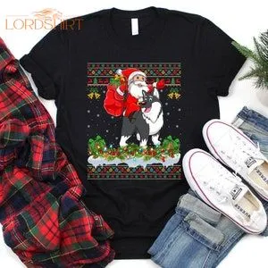 Ugly Santa Riding Alaskan Malamute Christmas T-shirt Alaskan